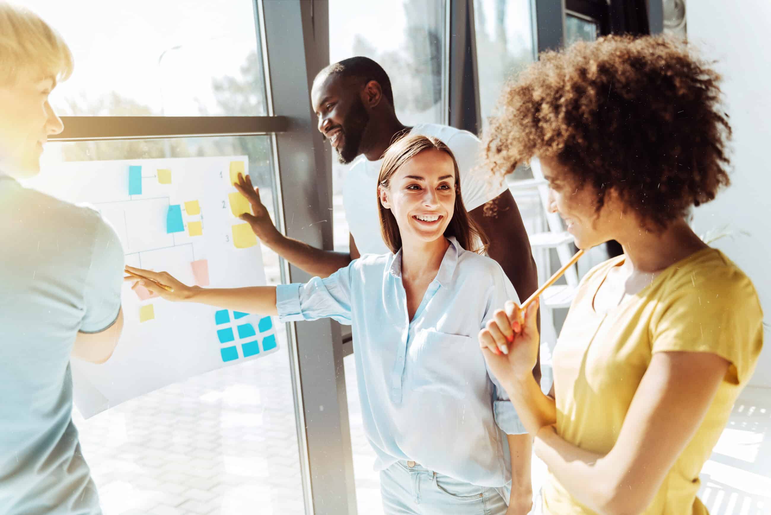 Cheerful young colleagues enjoying the teamwork